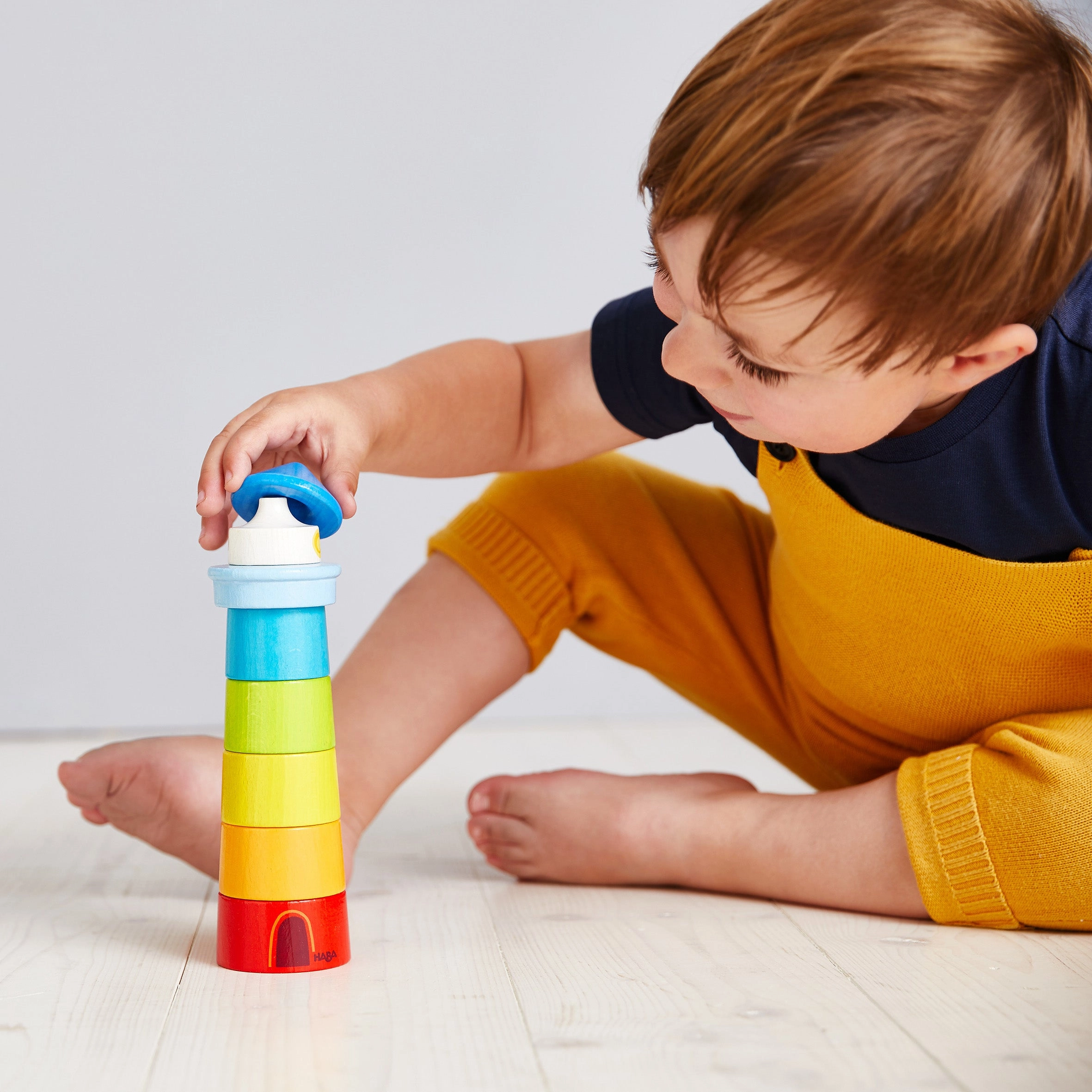 HABA Lighthouse Wooden Rainbow Stacker  Colorful Learning Toy
