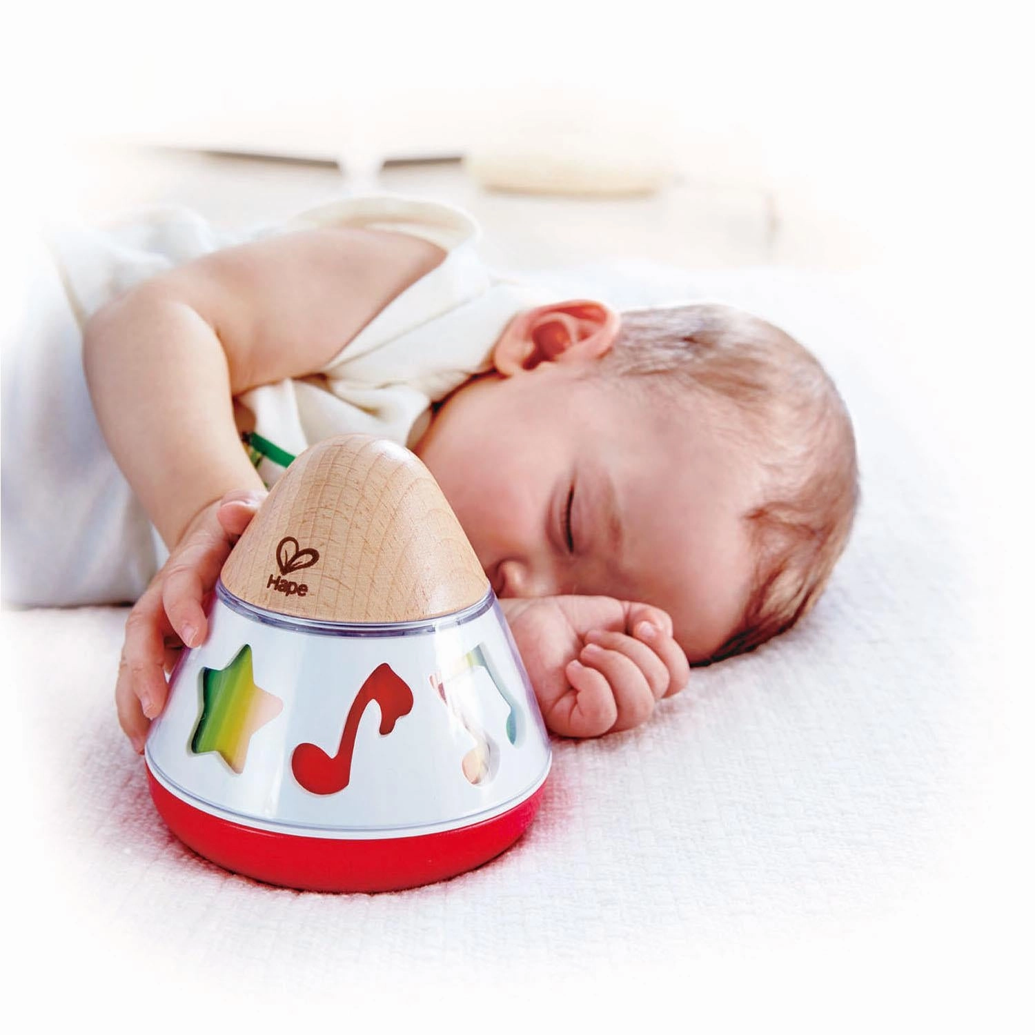 Hape Wind-Up Rotating Music Box with Colour Changing Design for Babies