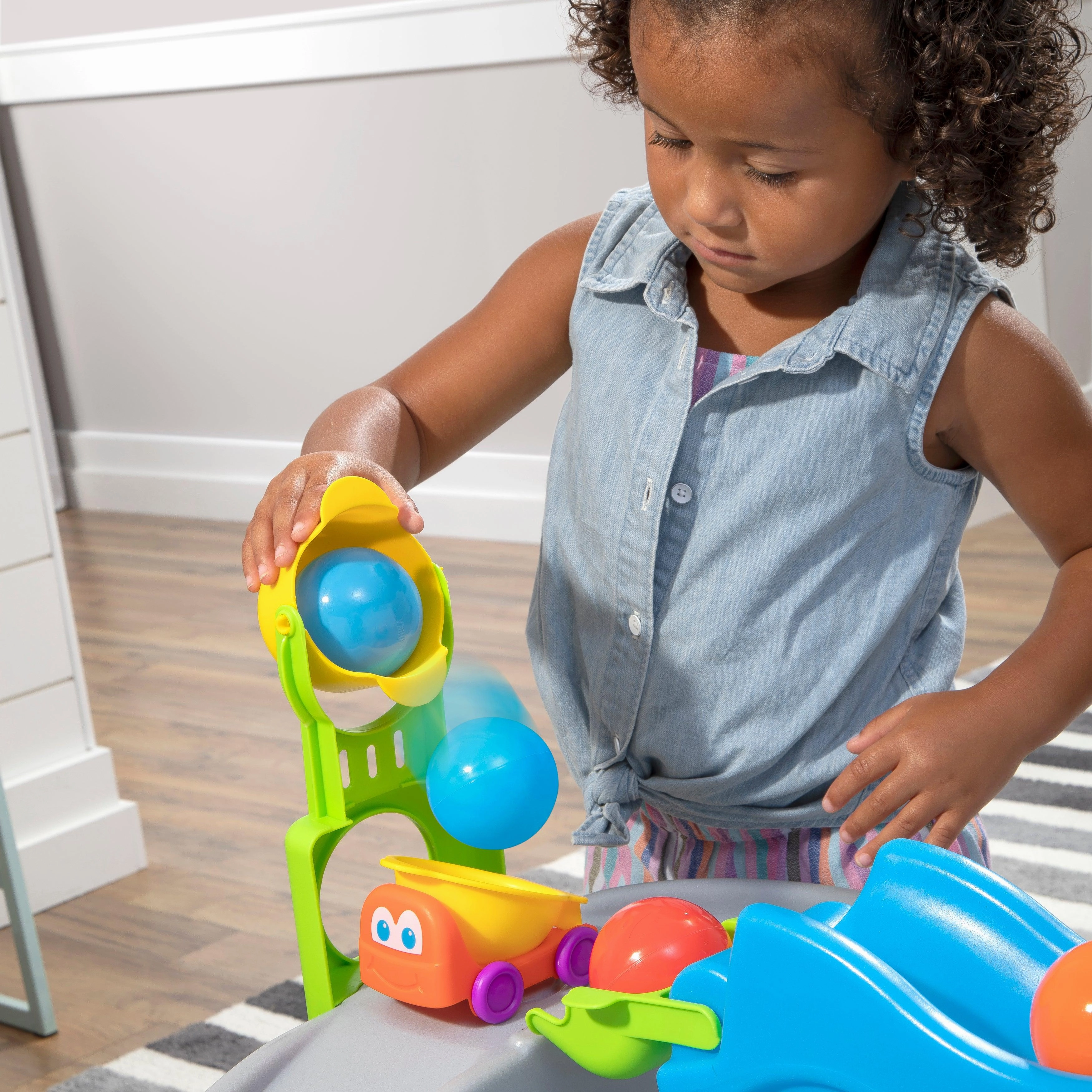Step2 Ball Buddies Truckin' & Rollin' Play Table STEM & Ball Toy with 12 Accessory Toys for Toddlers